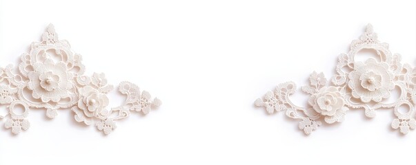 Elegant white lace floral corner decorations on a plain background.