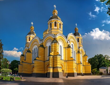 view of the st volodymyr s cathedral in kyiv against the blue sky in sunny day