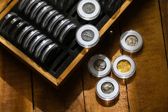 Numismatics, storage of ancient gold and silver coins in plastic boxes