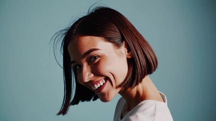 Young smiling happy cheerful fun satisfied cool woman she wearing white top shirt casual clothes looking camera isolated on plain pastel light blue cyan background studio portrait. Lifestyle concept - Powered by Adobe