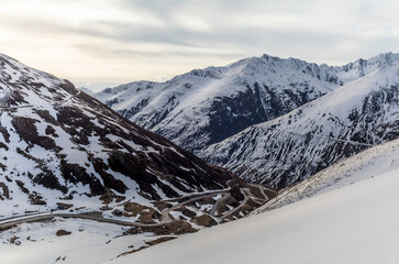 view of the hairpin bends of the road near Sedrun during a ski tour to Piz Pazzola