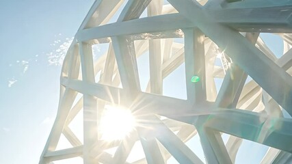 White Openwork Architectural Structure Under Sunlight