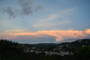 Tranquil Suburban Landscape at Dusk with Colorful Cloudscape
