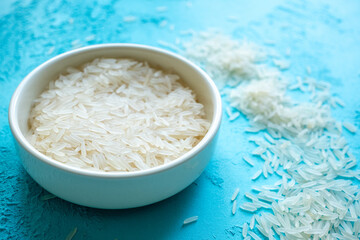 white rice in a coconut bowl close up