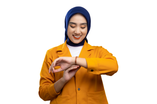 Smiling young Asian woman checking time on her watch with happy expression isolated on transparent background