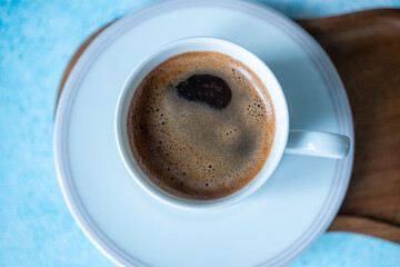 Close-up of local Turkish coffee foam in a white cup