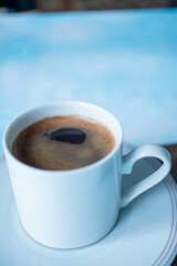 Close-up of local Turkish coffee foam in a white cup