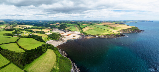 Panorama of Cliffs over Mothecombe Beach and Red Cove from a drone, River Emme, Mothecombe, Plymouth, South Devon, England, Europe
