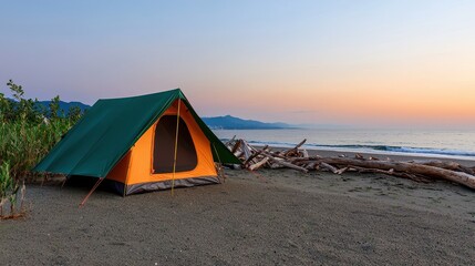 Serene Beach Camping Scene at Sunset with Tent and Ocean View