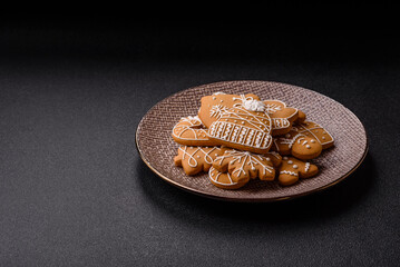 Christmas winter gingerbread, holiday biscuits on monochrome background