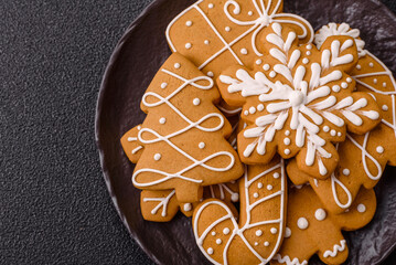 Christmas winter gingerbread, holiday biscuits on monochrome background