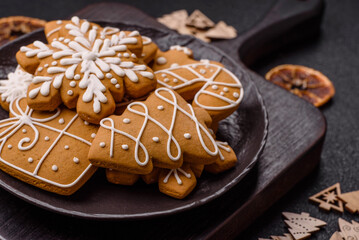 Christmas winter gingerbread, holiday biscuits on monochrome background