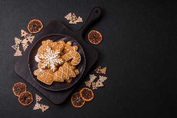 Christmas winter gingerbread, holiday biscuits on monochrome background