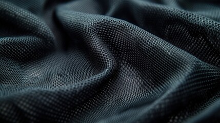 Naklejka premium Closeup dark gray textile texture, folds and patterns