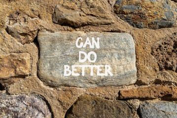 Can do better symbol. Concept words Can do better on beautiful grey stone wall. Beautiful stone wall background. Business and can do better concept. Copy space.