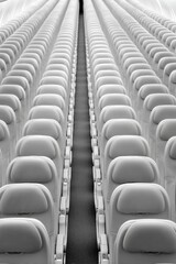 Obraz premium Minimalist Aviation Symmetry Sleek Commercial Jet Interior Revealing Precision Engineering and Modern Travel Infrastructure Design