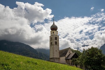 Fototapeta premium Historic church nestled in the Dolomite Alps of South Tirol, Italy