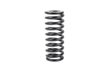Studio shot of glossy black compression spring isolated against a gray background