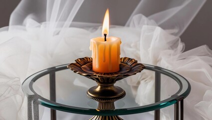 burning candle in a candlestick