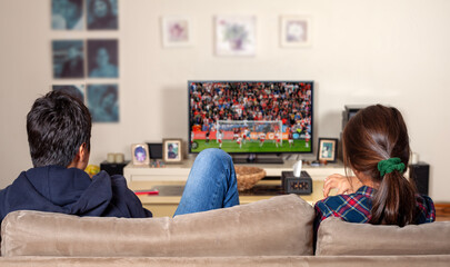 young people watching tv