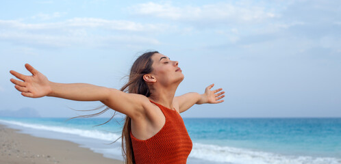 young woman relaxing at the beach