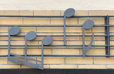 Music score sign made of metal