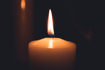 Candle burning in the church