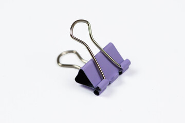 Colorful binder paper clips, isolated on white background