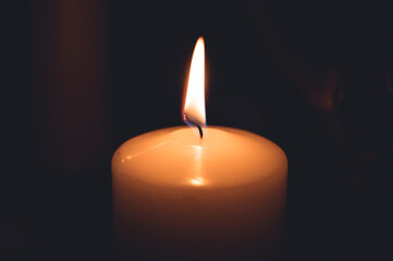 Candle burning in the church