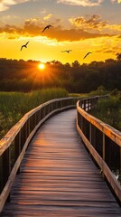 Fototapeta premium Sunset boardwalk with birds in flight