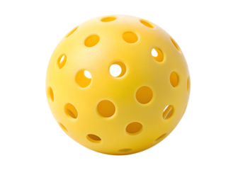 Close up yellow pickleball ball with multiple holes isolated on black background