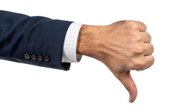 Businessman in suit making a thumbs down gesture isolated on black background