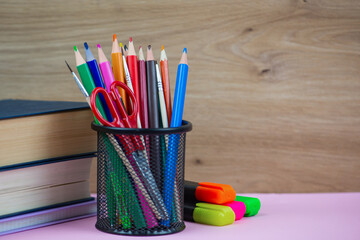 Fototapeta premium A Colorful Stationery Collection beautifully arranged on a Study Desk, showcasing vibrant tools