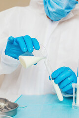 Examine milk in the laboratory. Selective focus.