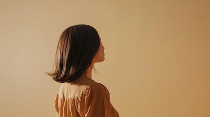 Rear side photo of charming adorable woman wear brown trendy clothes indicating herself isolated on beige color background