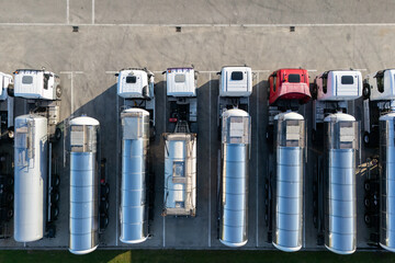 Fleet of trucks with tank trailers.