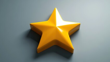 Obraz premium A glossy yellow 3D star-shaped object on a gray background.