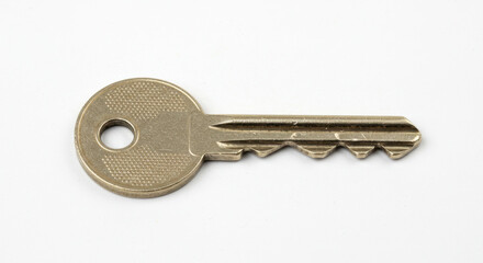 Brass Door Key Isolated on White Background