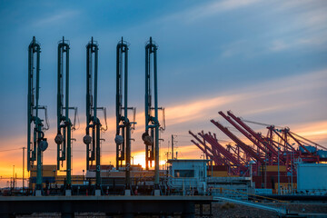 Port equipment at dusk