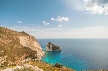 Experience the enchanting beauty of Zakynthos, where stunning cliffs meet crystal-clear waters. Enjoy vibrant beaches and traditional villages under the radiant summer sun