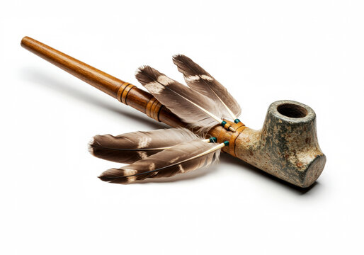 Native American peace pipe on white