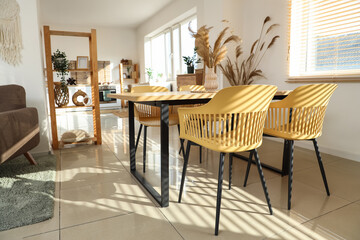 Interior of modern studio apartment with dining table
