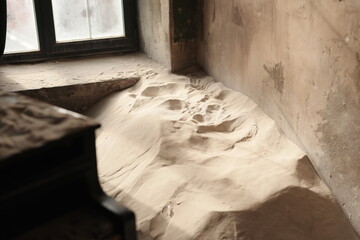 An Abandoned Room with Sand, showing the intersection of time and neglect, awaits exploration
