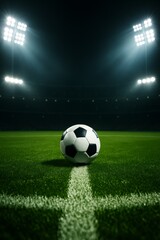 Bright Stadium Lights Illuminate a Soccer Ball on the Field During an Evening Match