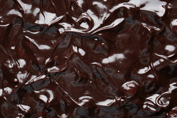 Sweet hot chocolate with chips as background, closeup