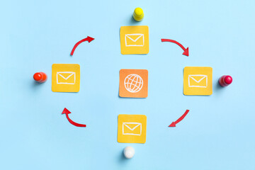 Connected figures with emails and Internet symbol on light background. Link concept