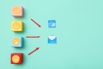 Connected smiles with message symbols on green background. Link concept