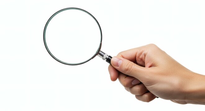 M&atilde;o segurando lupa isolada no fundo branco