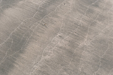 砂浜にいろいろな模様