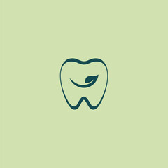Smiley Dental logo with teal tooth and leaf, modern design, eco-friendly oral dentist branding